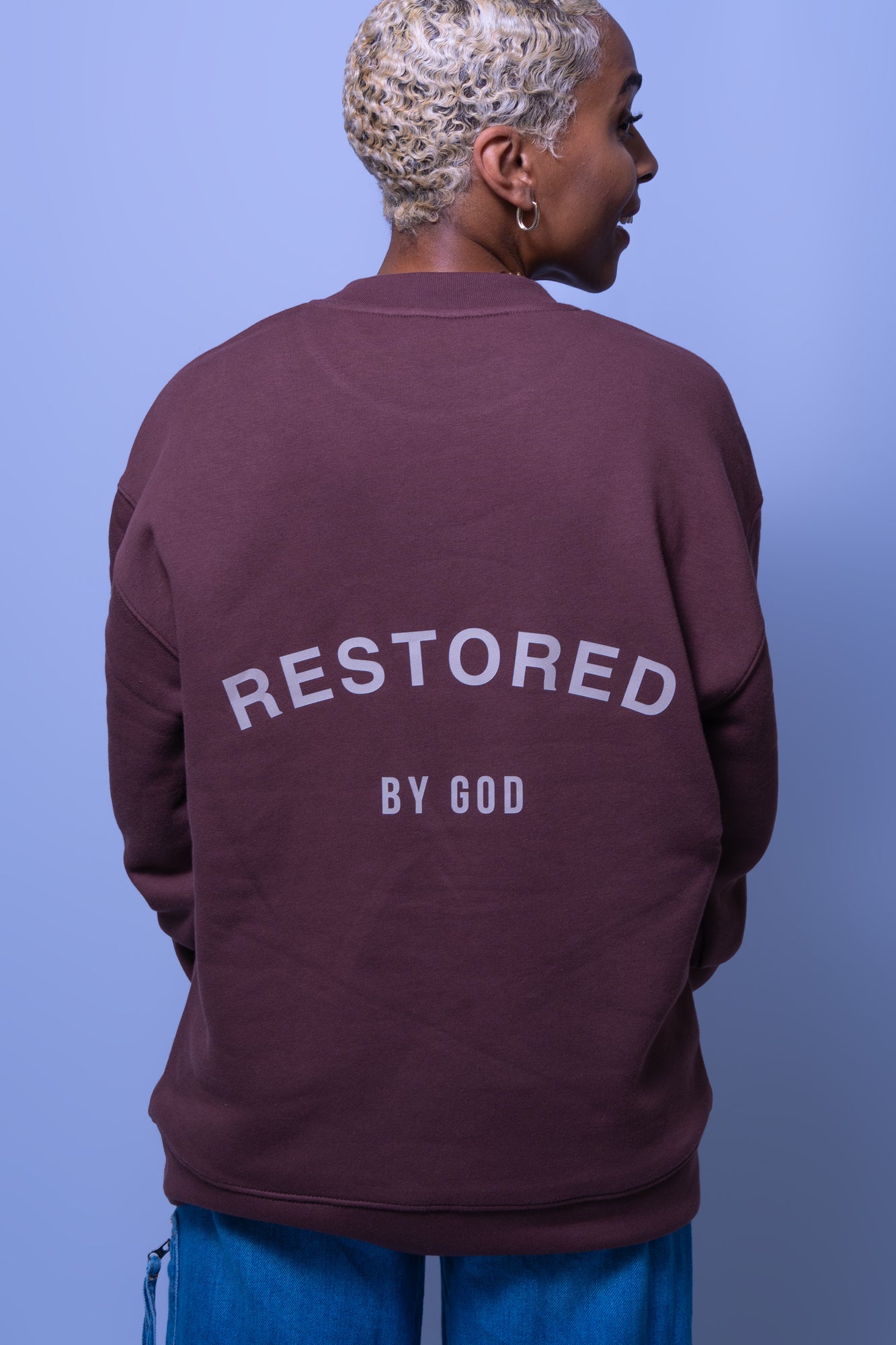 Restored brown unisex crewneck sweatshirt in chestnut brown with a relaxed fit. 