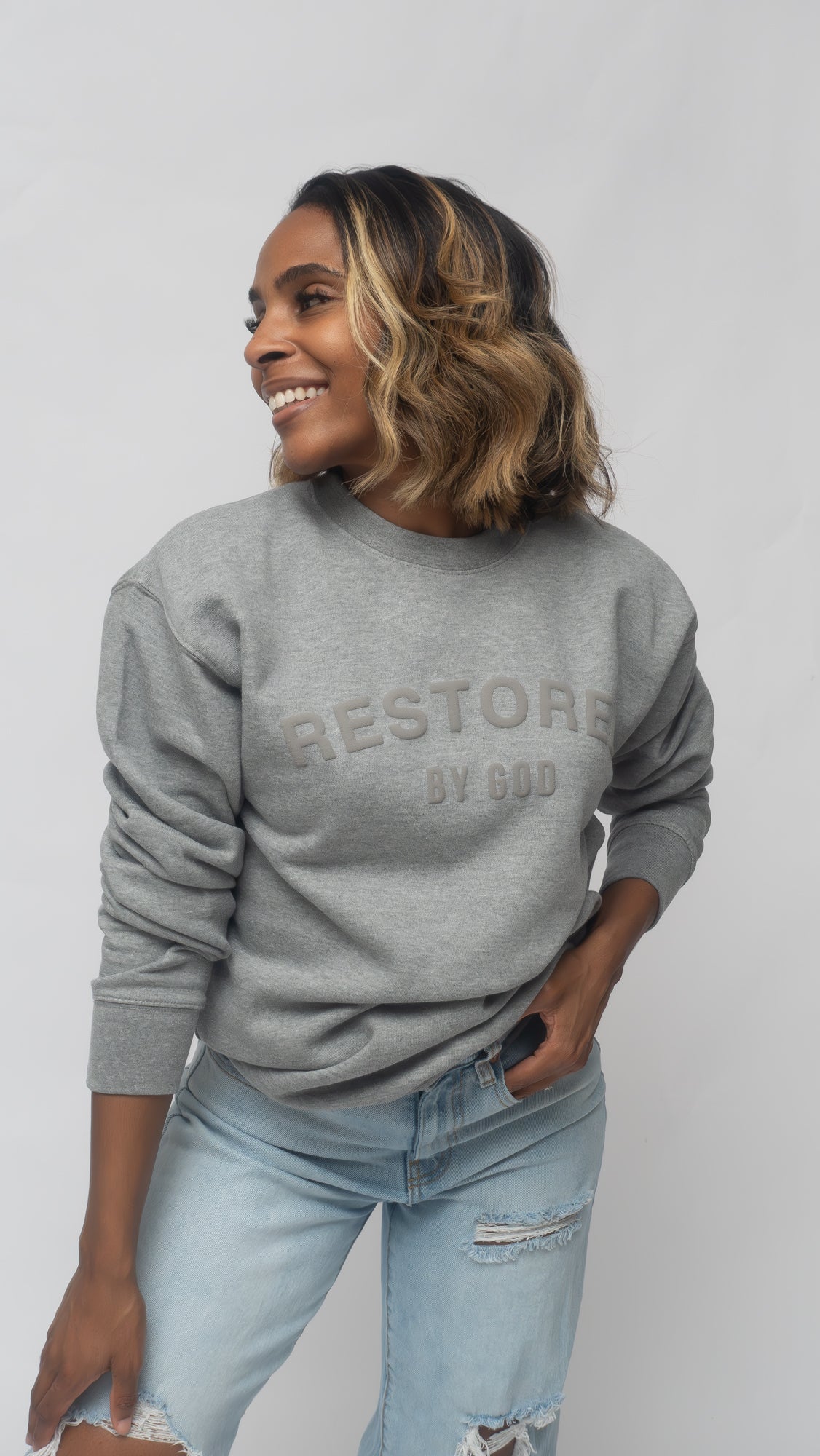 Restored by god grey christian streetwear unisex crewneck sweatshirt for fall weather in the color grey
