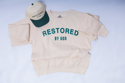 Restored BY God Oversized Sweatshirt tan and green. beige sweatshirt, oversized christian streetwear, faith based apparel, statement t shirt, statment sweatshirt, 