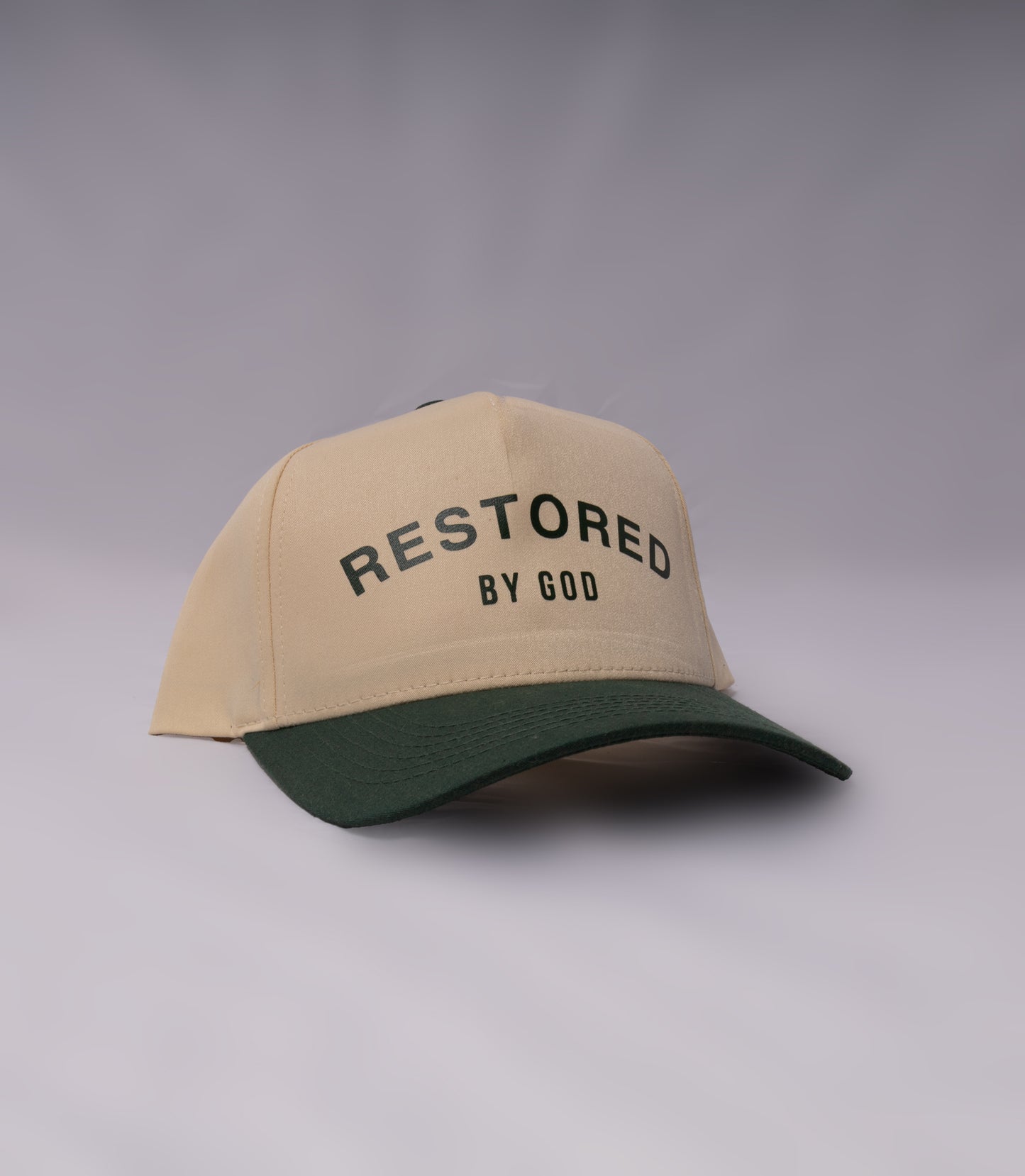 Restored By God one size fits all trucker hat. snap back, green and tan hat, green and beige hat, forest green, 