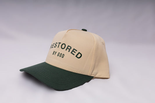 Restored By God one size fits all trucker hat. snap back, green and tan hat, green and beige hat, forest green, 