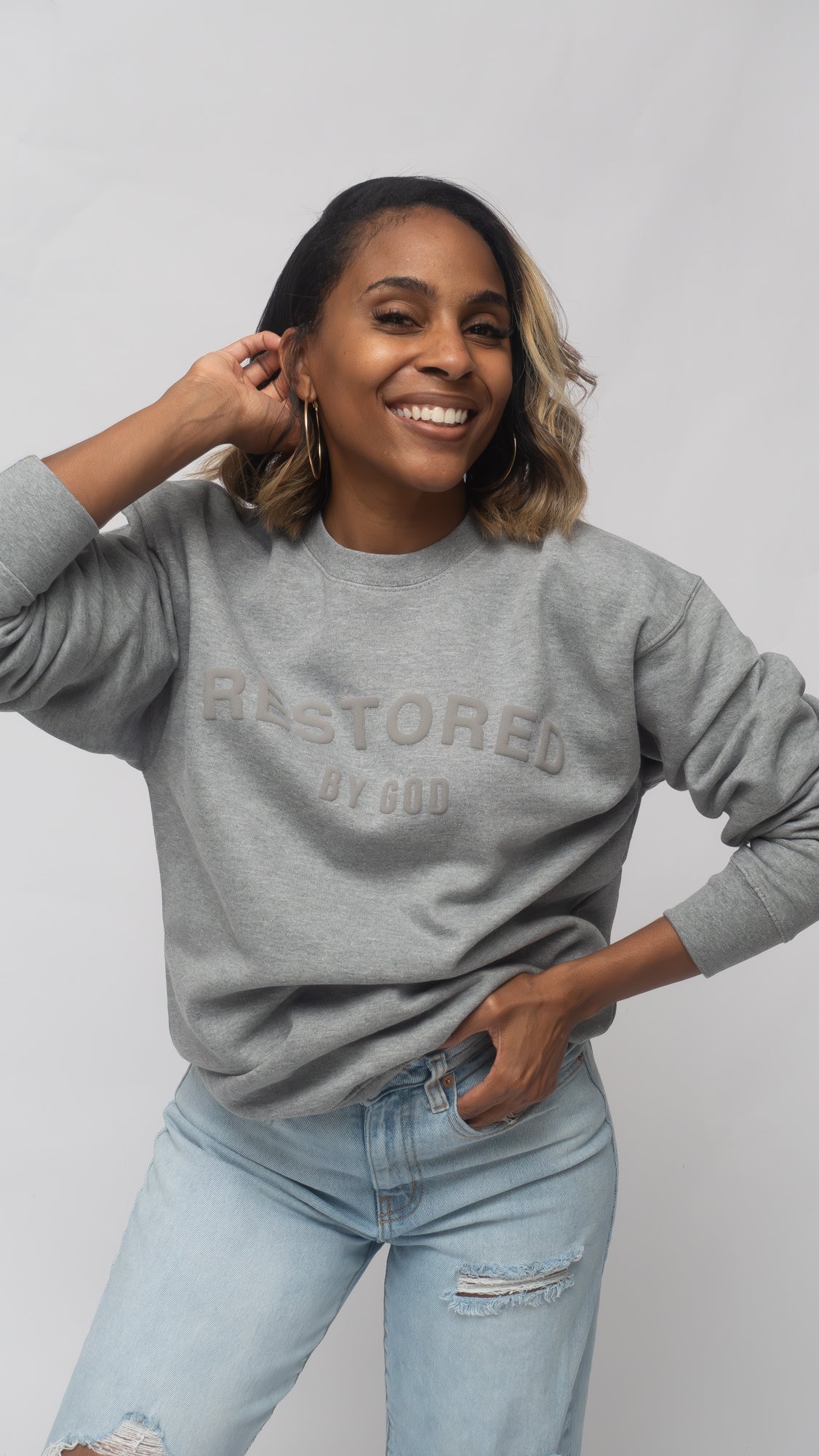 Restored by god grey christian streetwear unisex crewneck sweatshirt for fall weather in the color grey